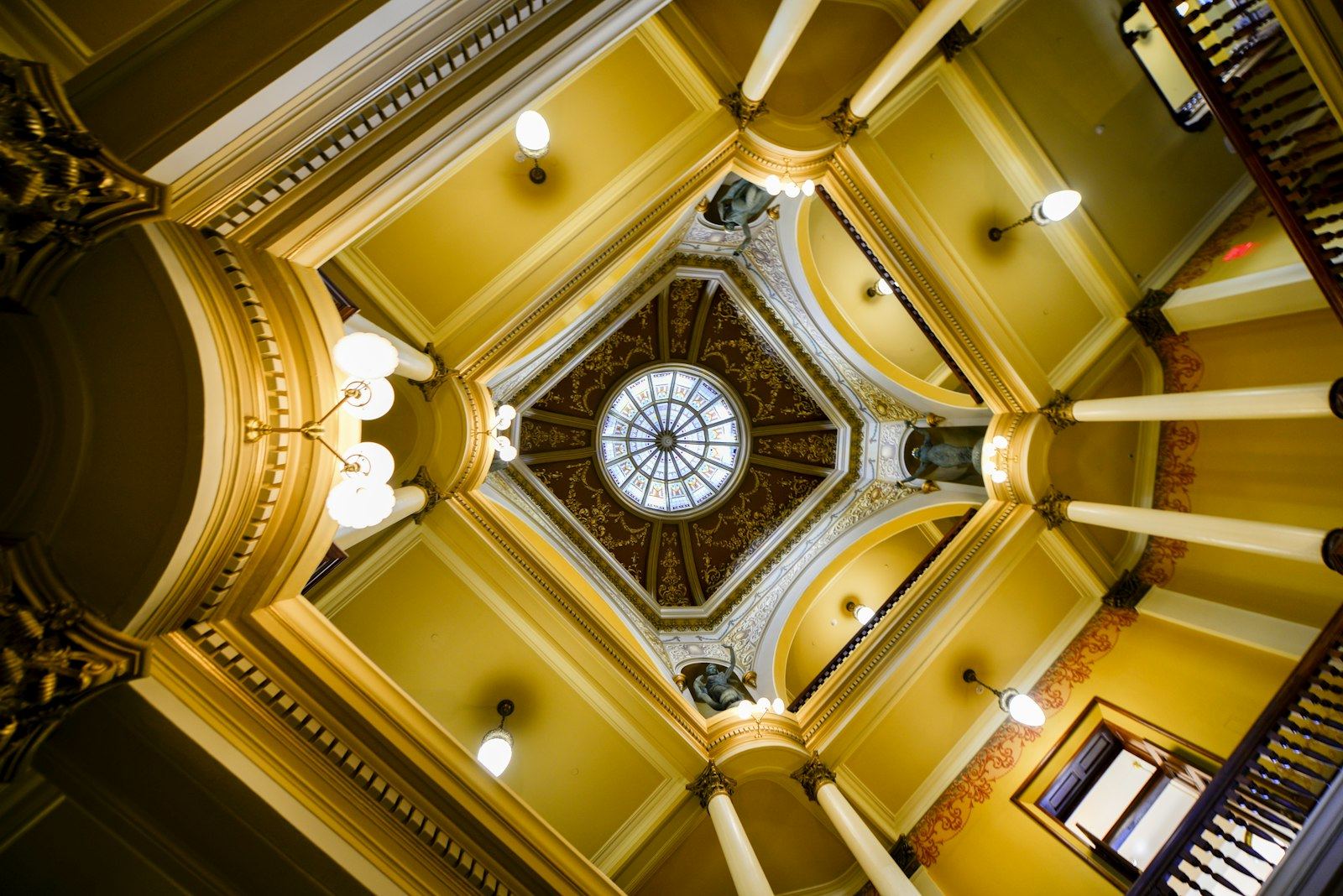 The gold-trimmed dome ceiling of the Wyoming State Capitol
